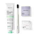 The Advanced Kit for kids includes toothpaste, toothbrush, mouthwash tablets, and floss on white.