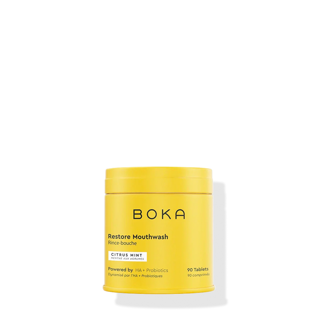 Yellow container of Boka Restore Mouthwash on a white background