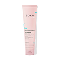Pink tube of Boka Kids Watermelon Mint Toothpaste on a white background